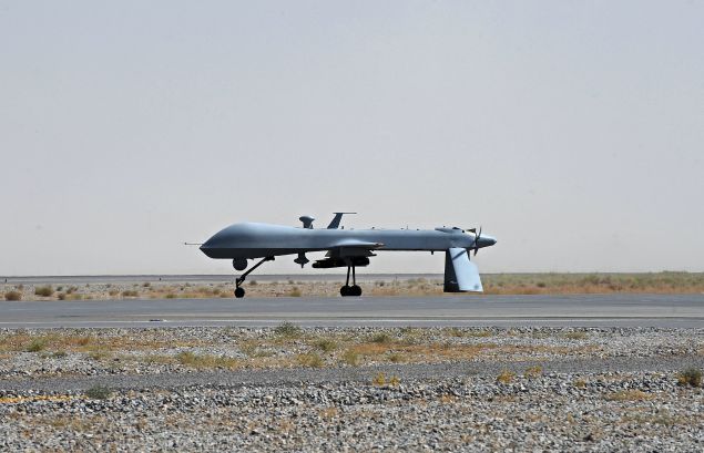 TO GO WITH: Pakistan-unrest-Afghanistan,FOCUS by Emmanuel Duparcq and S.H. Khan (FILES) In this file picture taken on on June 13, 2010, a US Predator unmanned drone armed with a missile stands on the tarmac of Kandahar military airport. Times are hard for Al-Qaeda in Afghanistan and Pakistan as the network has been weakened significantly by US drone strikes on their hideouts, the killing of founder Osama bin Laden in May 2011 and by finances drying up. AFP PHOTO/FILES/POOL/Massoud HOSSAINI (Photo credit should read MASSOUD HOSSAINI/AFP/Getty Images)