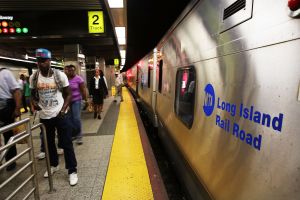NEW YORK, NY - JULY 15: A Long Island Rail Road (LIRR) train sits at the platform on July 15, 2014 in the Brooklyn borough of New York City. Currently there are no new negotiations scheduled between the Metropolitan Transportation Authority (MTA) and unions representing Long Island Rail Road workers after talks broke off abruptly on July 14. Around 300,000 riders, commuters and tourists, rely on the railroad every day which travels between Long Island and New York City. With Long Island Rail Road union leaders threatening to strike as early as Sunday, July 20, with pay increases and health care contributions are some of the issues being debated. (Photo by Spencer Platt/Getty Images)