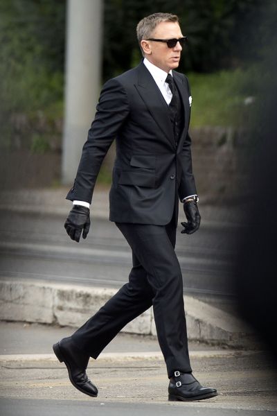 English actor Daniel Craig walks during the shooting of scenes for the 24th James Bond movie 'Spectre' in Rome on February 21, 2015. The 24th film in the Bond film series, 'Spectre' is slated for release later this year. AFP PHOTO / TIZIANA FABI (Photo credit should read TIZIANA FABI/AFP/Getty Images)