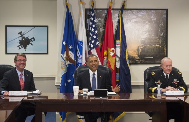 US President Barack Obama holds a meeting with Secretary of Defense Ashton Carter (L), Chairman of the Joint Chiefs of Staff Martin Dempsey (R) and top military officials at the Pentagon in Washington, DC, July 6, 2015. Obama is at the Pentagon on Monday for an update on the campaign against the Islamic State group in Iraq and Syria. The briefing on US-led efforts to dismantle the jihadist group follows coalition air strikes that hit its de facto capital Raqa in Syria over the weekend. AFP PHOTO / SAUL LOEB (Photo credit should read SAUL LOEB/AFP/Getty Images)
