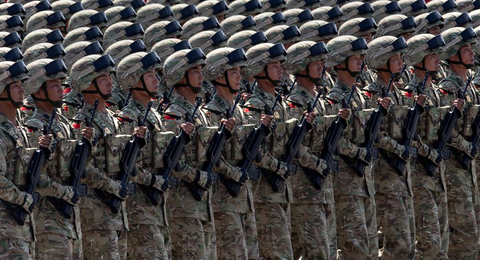 BEIJING, CHINA - Chinese soldiers march in formation. 