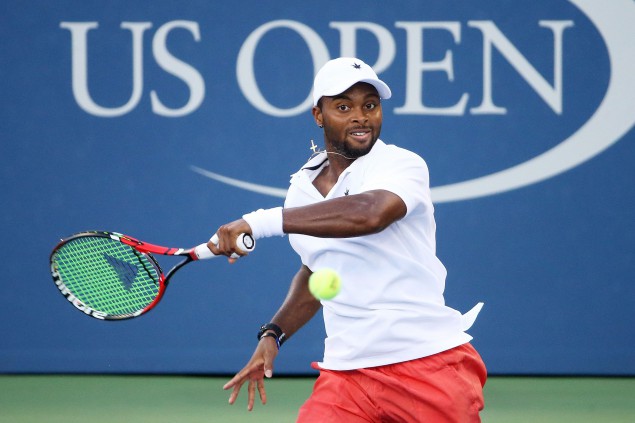 NEW YORK, NY - SEPTEMBER 05: Donald Young of the United States returns a shot to Viktor Troicki of Serbia during their Men's Singles Third Round match on Day Six of the 2015 US Open at the USTA Billie Jean King National Tennis Center on September 5, 2015 in the Flushing neighborhood of the Queens borough of New York City. (Photo by Streeter Lecka/Getty Images)