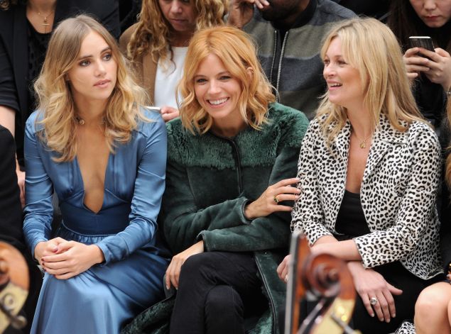 Suki Waterhouse, Sienna Miller and Kate Moss in their Burberry best (Photo: Stuart C. Wilson/Getty Images for Burberry).