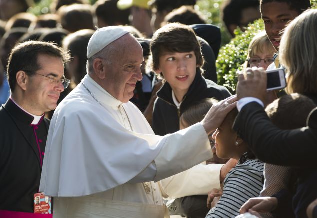 Pope Francis greets well-wishers the Apostolic Nunciature to the United States on September 24, 2015 in Washington, DC. AFP PHOTO/MOLLY RILEY (Photo credit should read MOLLY RILEY/AFP/Getty Images)