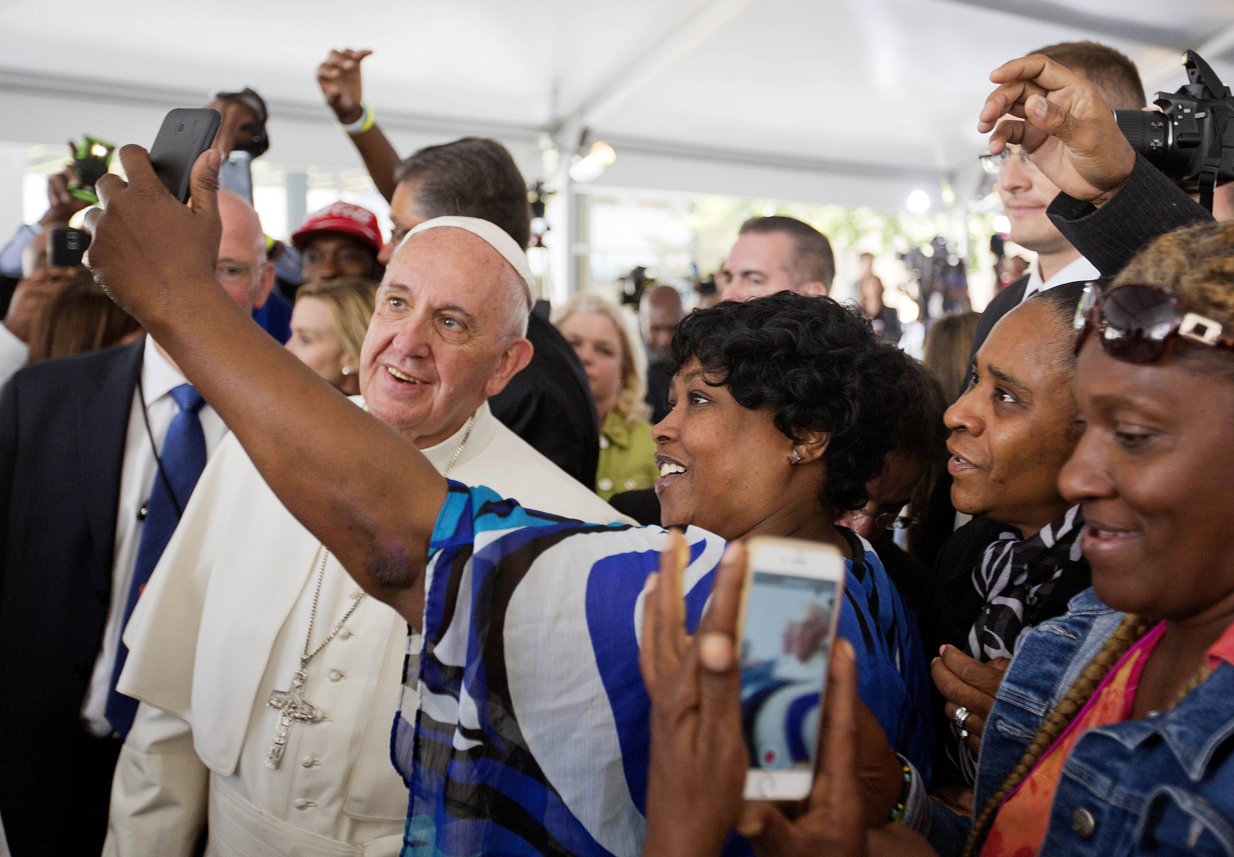 Heaven only knows how many selfies Pope Francis will pose for. Here he takes one with Cartrice Haynesworth, in Washington, DC. (Photo by David Goldman-Pool/Getty Images)