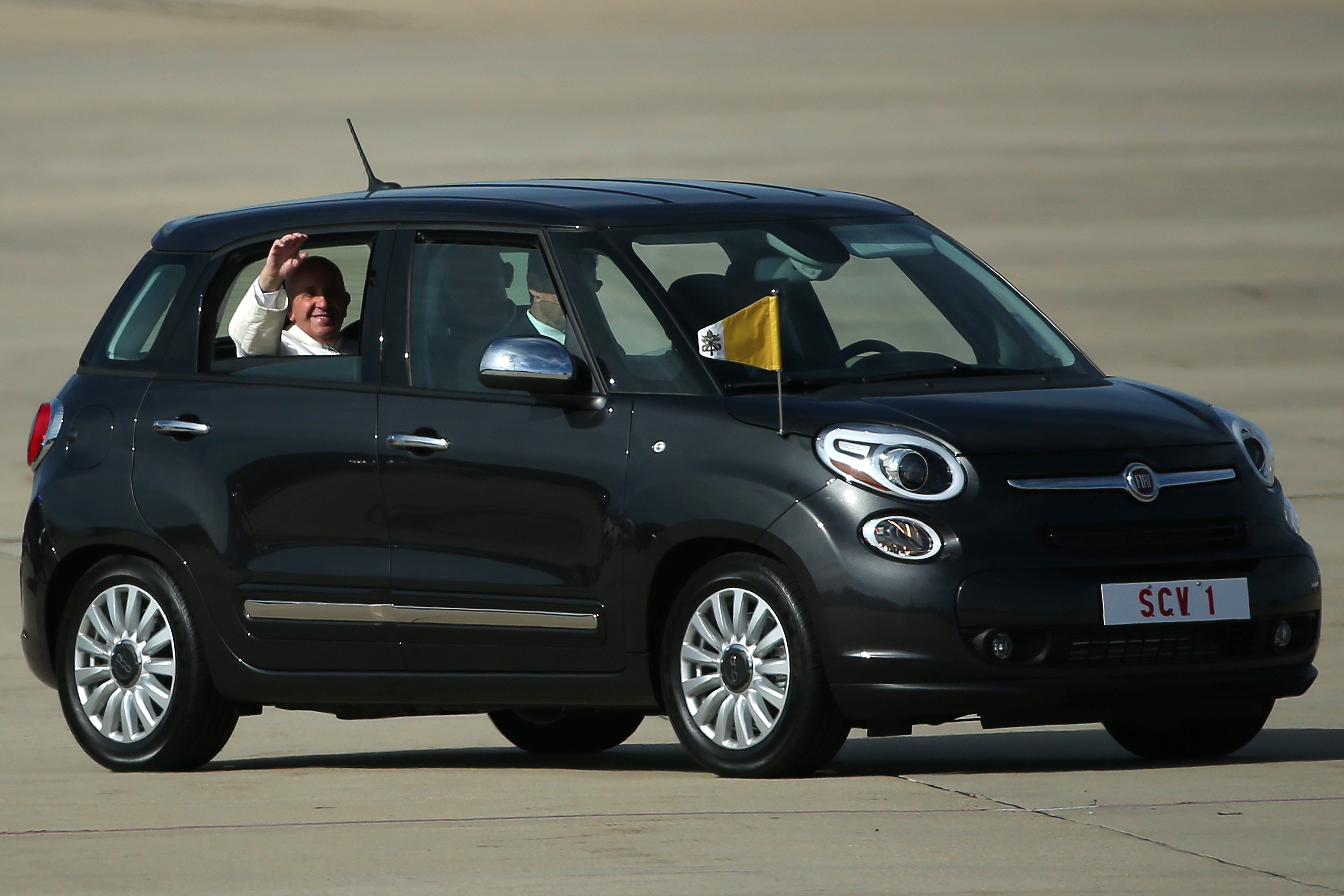  Pope Francis arrives for his departure from Washington, DC en route to New York City in his Fiat. (Photo by Patrick Smith/Getty Images)