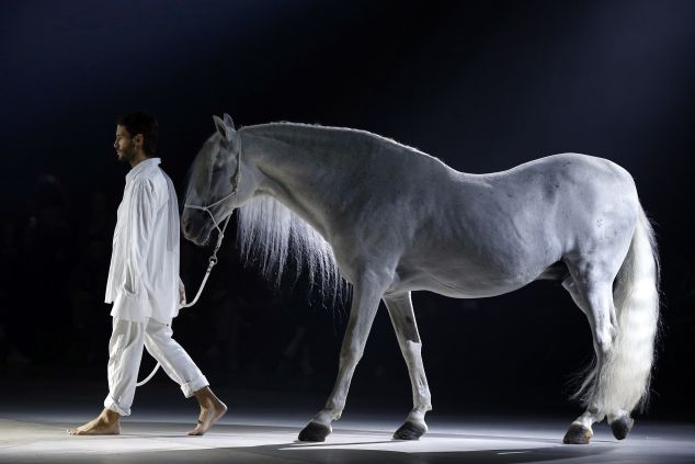 Designer Simon Porte and his equis (Photo: Francois Guillot/AFP/Getty Images).