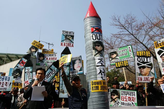 SEOUL, SOUTH KOREA - APRIL 02: People participate in a protest against North's rocket launch on April 2, 2009 in Seoul, South Korea. North Korea schedule the rocket launch between April 4 to 8. (Photo by Chung Sung-Jun/Getty Images)
