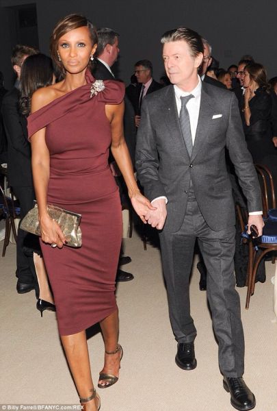 David Bowie (not quite as young but still beautiful), shown here with his wife Iman at the Museum of Modern Art 2013. (Courtesy: BFANYC)