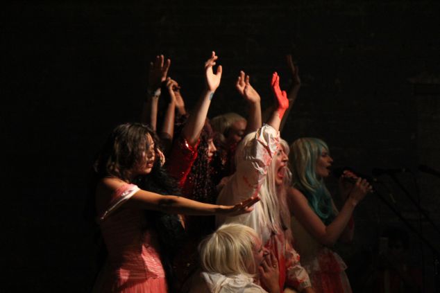Jenny Hval performs in Basilica's North Hall with a troupe of Hudson locals, including Zia Anger and her cousin Annie. (Justin Joffe for Observer)