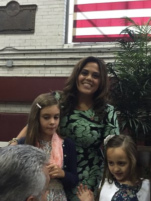 Suarez at her swearing-in with her nieces Anabelle and Sophia.