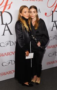 NEW YORK, NY - JUNE 01: Mary-Kate Olsen and Ashley Olsen pose on the winners walk at the 2015 CFDA Fashion Awards at Alice Tully Hall at Lincoln Center on June 1, 2015 in New York City. (Photo by Larry Busacca/Getty Images)