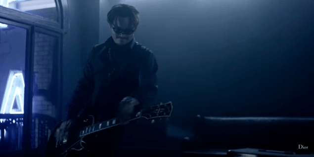 No other band members. (Photo: YouTube/Christian Dior)