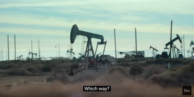 "Should I make my new home amongst large industrial equipment?" (Photo: YouTube/Christian Dior)