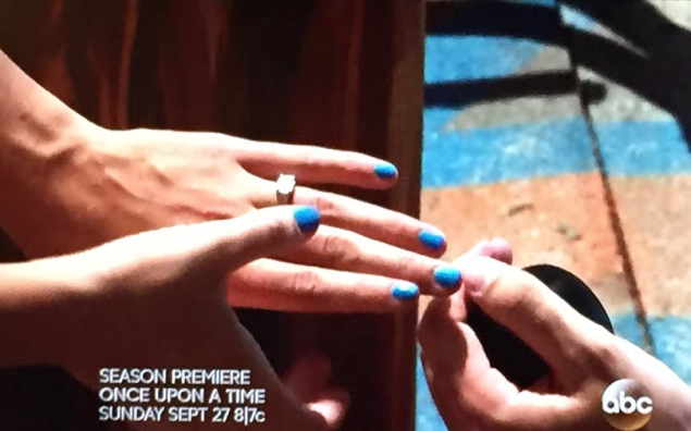 The nails of the engaged person's hand: definitely blue. (Photo: ABC)