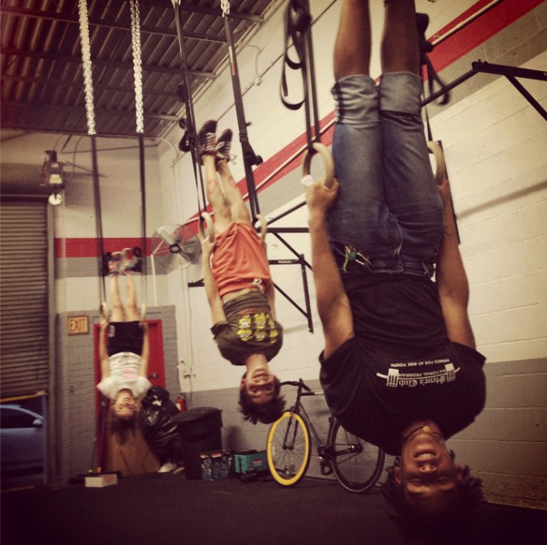 Athletes hang upside-down at Gantry Kids. (Photo: Facebook/Gantry Kids)