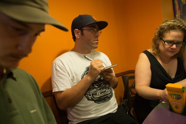 Jason Polan (middle) has been throwing the Taco Bell eat and draw for 10 years. - Aaron Adler for New York Observer