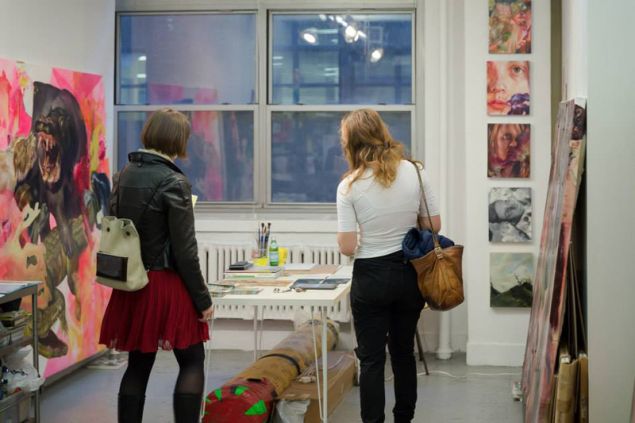 Visitors in Angela Fraleigh's studio during EFA Open Studios 2014. (Photo: Matthew Vicar)