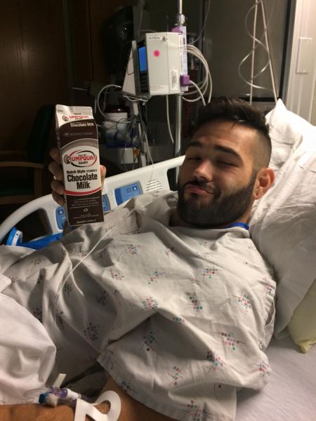Chris Mintz recovering in an Oregon hospital bed. (Kivonna Coccia)