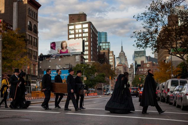 Raised eyebrows were de rigueur during the funeral procession to the Marble Cemetery. (Michael Nagle for Observer)