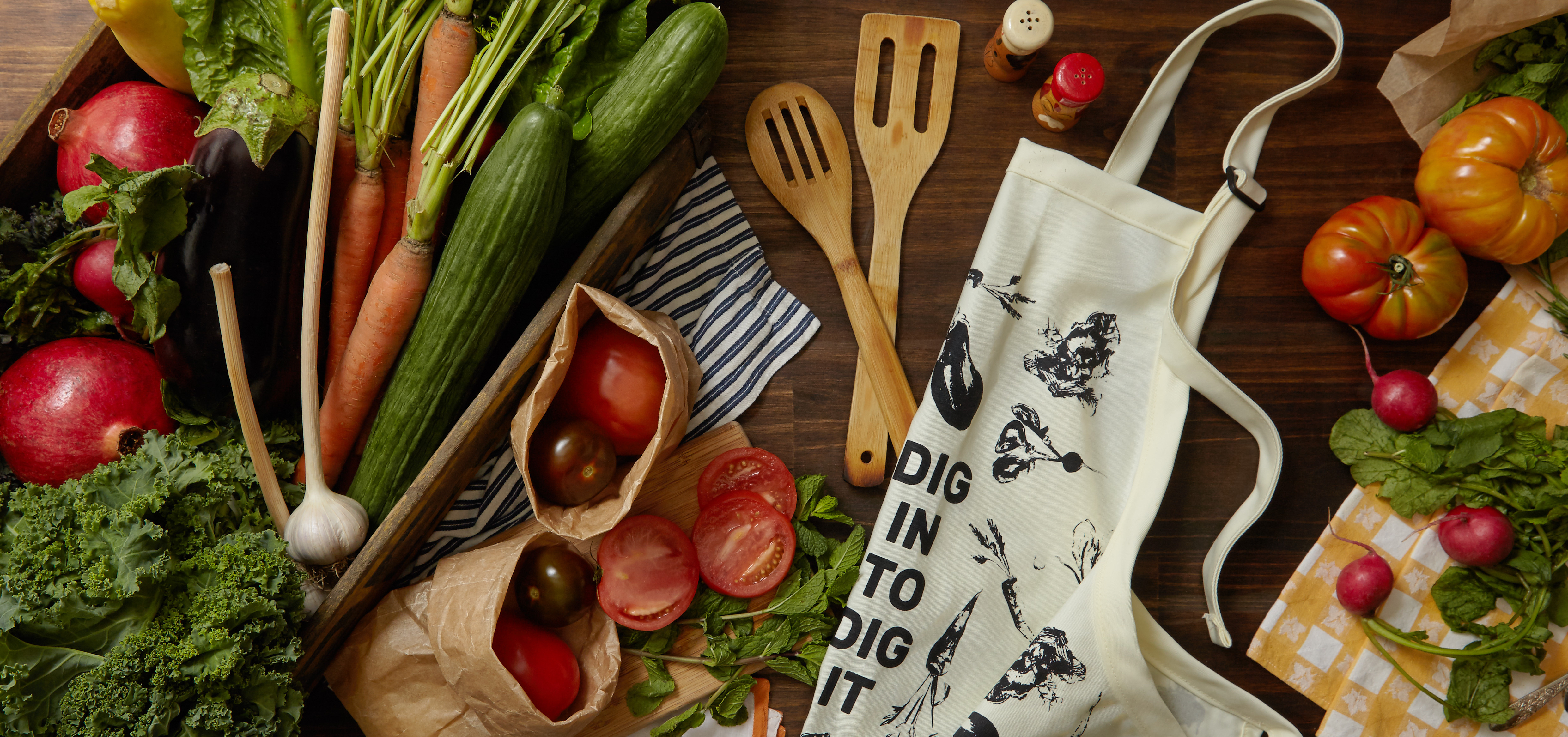The "Food for Thought, Food for Life" collection will also feature a cotton twill apron that reads "Dig in to Dit it." 