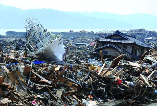A fishing boat lies among the tsunami rubble at Otsuchi town in Iwate. (Photo: TOSHIFUMI KITAMURA/AFP/Getty Images)