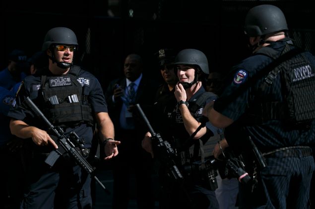 NEW YORK, NY - SEPTEMBER 24: Members of the NYPD Strategic Response Group stand outside St. Patrick's Cathedral while Pope Francis attends Vespers inside on September 24, 2015 in New York, NY. Pope Francis is on a five-day trip to the USA, which includes stops in Washington DC, New York and Philadelphia, after a three-day stay in Cuba. (Photo by Aristide Economopoulos-Pool/Getty Images)