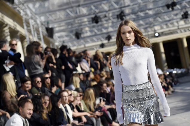 A model presents a creation by Isabel Marant during the 2016 Spring/Summer ready-to-wear collection fashion show, on October 2, 2015 in Paris. AFP PHOTO / MIGUEL MEDINA (Photo credit should read MIGUEL MEDINA/AFP/Getty Images)