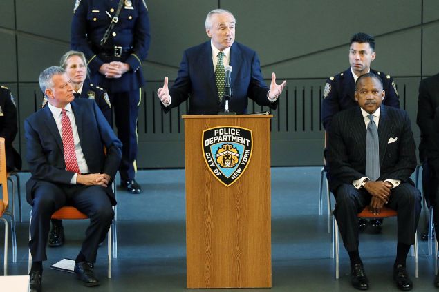 YORK, NY - OCTOBER 08: New York City Police Commissioner Bill Bratton speaks at a Swearing-In ceremony form police officers with New York Mayor Bill de Blasio (L) at the Police Academy on October 8, 2015 in New York City. A total of seven hundred and fifty officers were sworn-in at the event and will take to the city streets following months more of training. Following concerns about excessive force, the New York Police Department recently launched a new program that will force all officers to document and review every physical encounter with the public. (Photo by Spencer Platt/Getty Images)