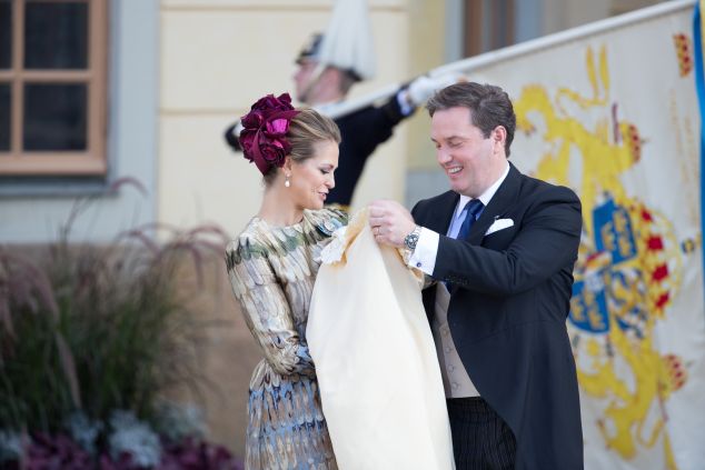 Princess Madeleine wore a brightly-colored flower-shaped fasincator. (Photo: Luca Teuchmann/Getty Images)