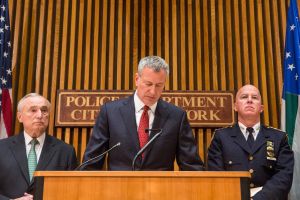 Commissioner Bill Bratton, Mayor Bill de Blasio, and NYPD Chief of Department James O'Neill today. (Photo by Andrew Burton/Getty Images)
