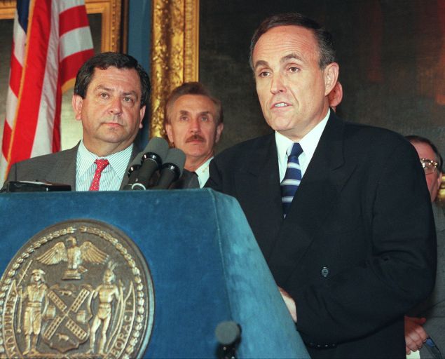 NEW YORK, UNITED STATES: New York City Mayor Rudy Giuliani (R) discusses 01 August the 31 July raid in Brooklyn which netted two terrorism suspects. James Kallstrom, the head of the FBI's New York office, stands next to Giuliani during the press conference at City Hall in New York. AFP PHOTO/ HENNY RAY ABRAMS (Photo credit should read HENNY RAY ABRAMS/AFP/Getty Images)
