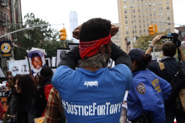 A protestor on 6th Avenue