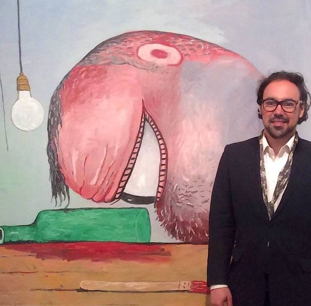 Luke JP Morgan in front of a Phillip Guston. (Photo: Courtesy of Goldhurst)