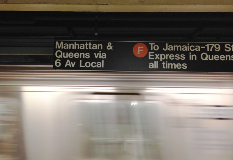 Sign above a subway platform.