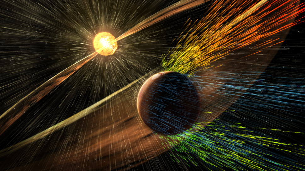 Artist’s rendering of a solar storm hitting Mars and stripping ions from the planet's upper atmosphere. (Photo: NASA/GSFC)
