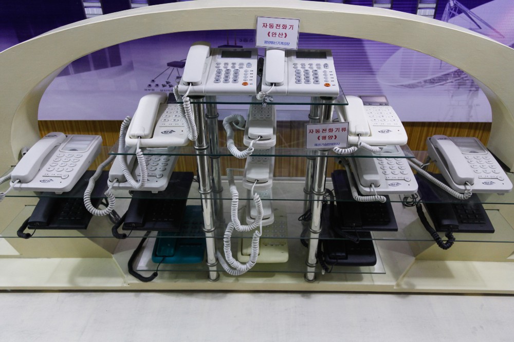 A display of landline phones at The Three Revolutions Museum