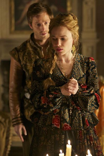 Photo 5: On Greer- Custom made dress with Peacock print velvet from B & J Frabrics in NY Reign -- "Fugitive" -- Image Number: RE220a_0200.jpg -- Pictured (L-R): Jonathan Keltz as Leith and Celina Sinden as Greer -- Photo: -- Sven Frenzel/The CW -- é 2015 The CW Network. All Rights Reserved.