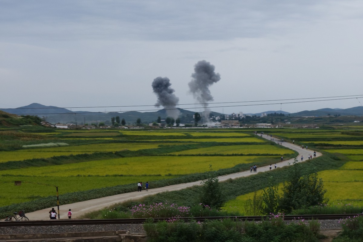 The aftermath of two rocket explosions, less than one mile away from us