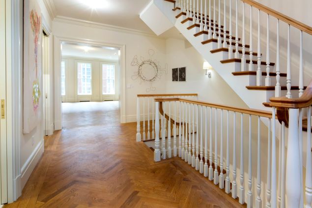 A nook by the stairs provides breathing space... or a space to catch one's breath. (Cary Horowitz/Brown Harris Stevens.)