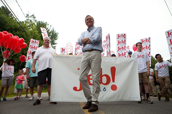 AMHERST, NH - JULY 4: Republican Presidential candidate Jeb Bush marches in the 4th of July Parade on July 4, 2015 in Amherst, New Hampshire. Bush is a front-runner in the polls for the 2016 presidential race with 14 other republican candidates. (Photo by Kayana Szymczak/Getty Images)