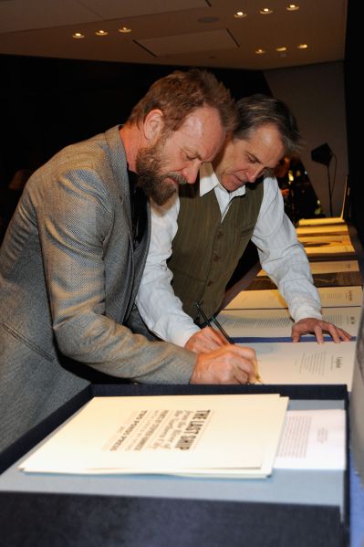 NEW YORK, NY - NOVEMBER 16: Musician Sting (L) and artist Stephen Hannock celebrate their new book "The Last Ship" at Hearst Tower on November 16, 2015 in New York City. (Photo by Rabbani and Solimene Photography/Getty Images for Hearst)