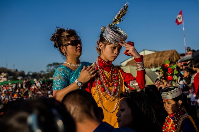 SHILLONG, INDIA - A tribal Khasi maiden in traditional costume, ahead of at traditional dance (Photo by Daniel Berehulak /Getty Images).