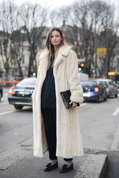 A prime example of a dramatic long coat (Photo: Vanni Bassetti/Getty Images).