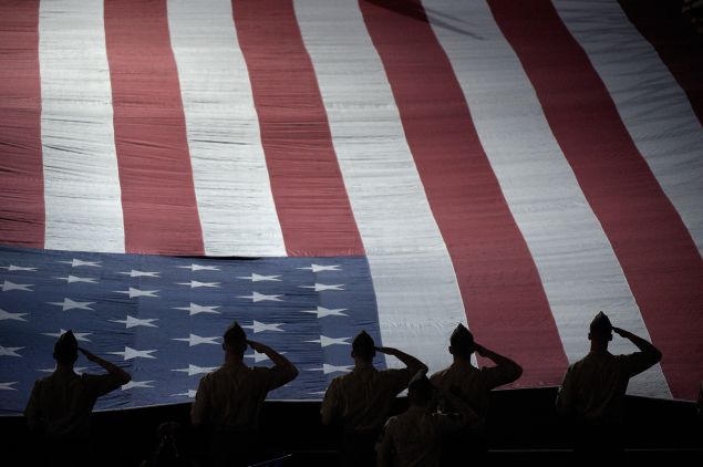 INDIAN WELLS, CA - MARCH 13: American Serviceman stand while the National Anthem is played during the Salute to Heroes cermony during the BNP Parisbas Open at the Indian Wells Tennis Garden on March 13, 2015 in Indian Wells, California. (Photo by Harry How/Getty Images)