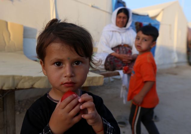 Displaced Iraqis from the Yazidi community, who fled violence between Islamic State (IS) group jihadists and Peshmerga fighters in the northern Iraqi town of Sinjar, are seen at a camp for internally displaced persons (IDP) in the Sharya area some 15 kilometres from the northern Iraqi city of Dohuk on May 20, 2015. AFP PHOTO / SAFIN HAMED (Photo credit should read SAFIN HAMED/AFP/Getty Images)