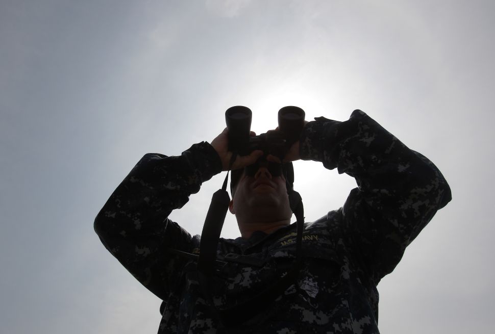 SEOUL, SOUTH KOREA - JULY 06: A U.S. Navy looks binocular during the Combined Joint Logistics Over the Shore (CJLOTS) exercise at the Anmyeon seashore on July 6, 2015 in Taean, South Korea. This exercise will train the South Korea-U.S. service members on how to accomplish vital logistical measures in an area with strategic access to Seoul. Approximately 900 U.S. and 800 South Korea personnel participates in the exercise. 