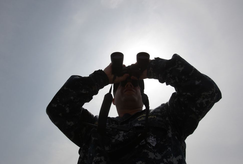 SEOUL, SOUTH KOREA - JULY 06: A U.S. Navy looks binocular during the Combined Joint Logistics Over the Shore (CJLOTS) exercise at the Anmyeon seashore on July 6, 2015 in Taean, South Korea. This exercise will train the South Korea-U.S. service members on how to accomplish vital logistical measures in an area with strategic access to Seoul. Approximately 900 U.S. and 800 South Korea personnel participates in the exercise.