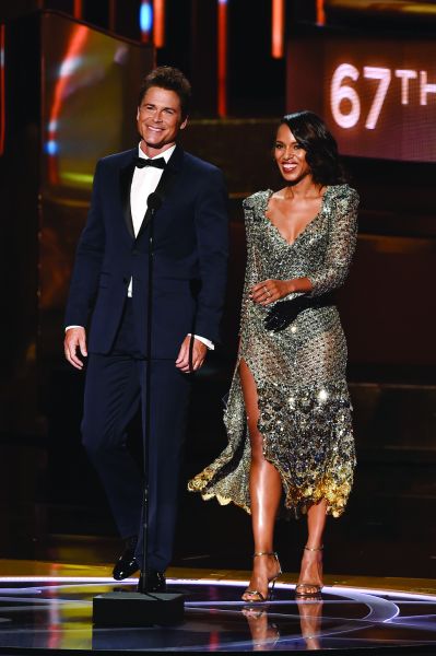 Rob Lowe in a navy Burberry suit with Kerry Washington (Photo: Kevin Winter/Getty Images).