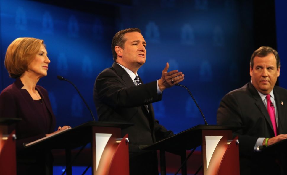 BOULDER, CO - OCTOBER 28: Presidential candidate Sen. Ted Cruz (C) (R-TX) speaks while New Jersey Gov, Chris Christie (R) and Carly Fiorina look on during the CNBC Republican Presidential Debate at University of Colorados Coors Events Center October 28, 2015 in Boulder, Colorado. Fourteen Republican presidential candidates are participating in the third set of Republican presidential debates. (Photo by Justin Sullivan/Getty Images)